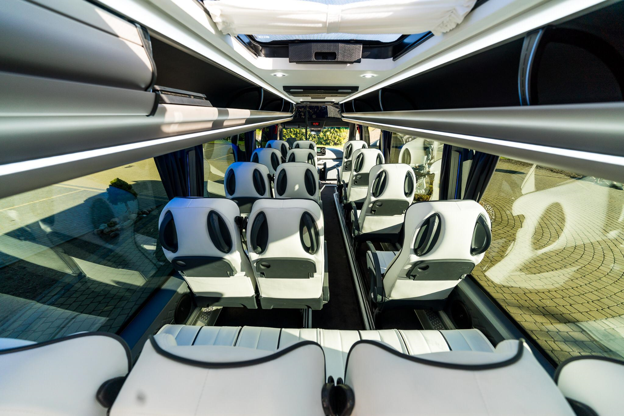 inside picture vip sprinter minibus white leather seats